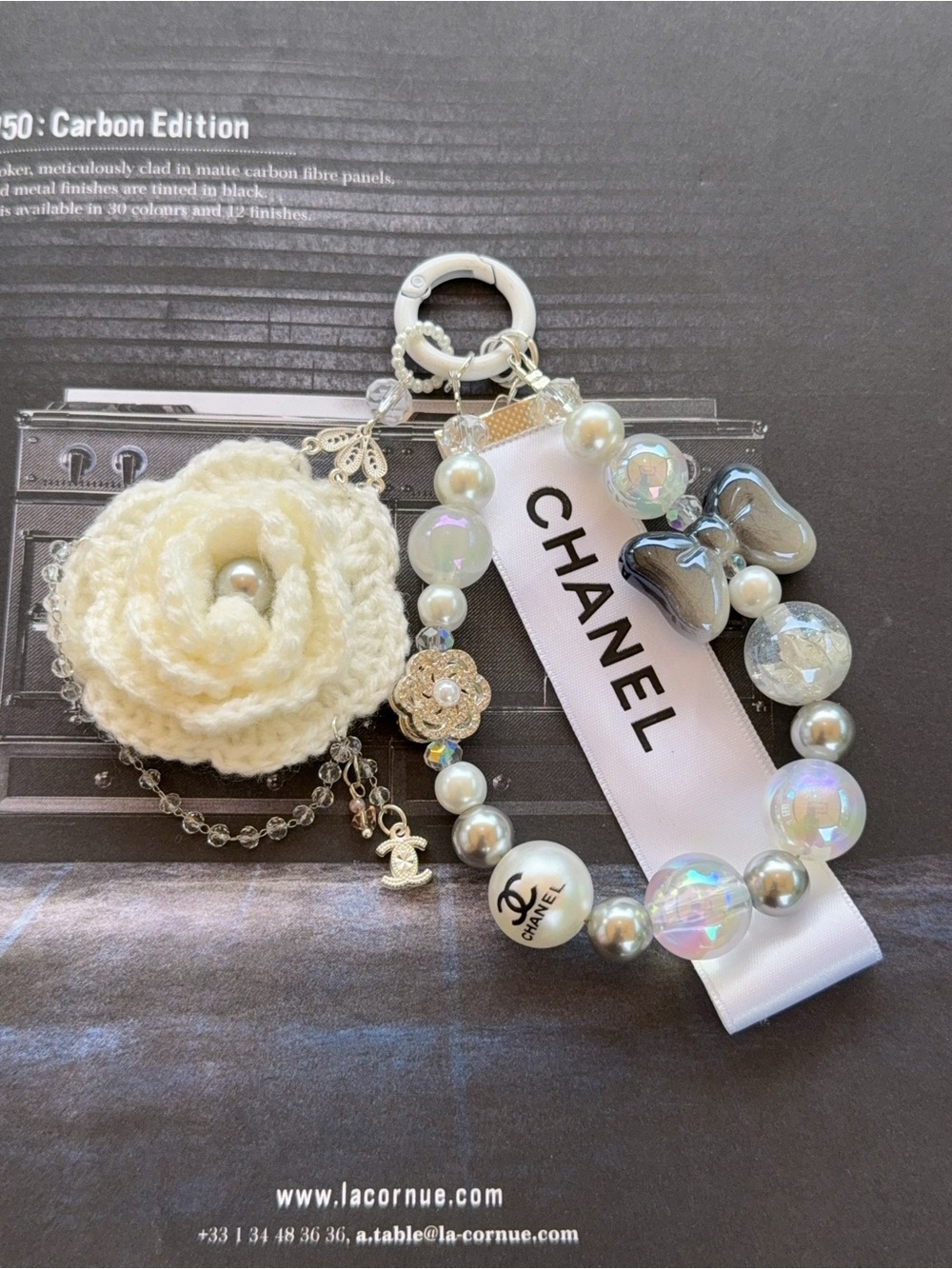 Handmade unbranded Crochet Camellia & Pearl phone Charm with Authentic CC Ribbon